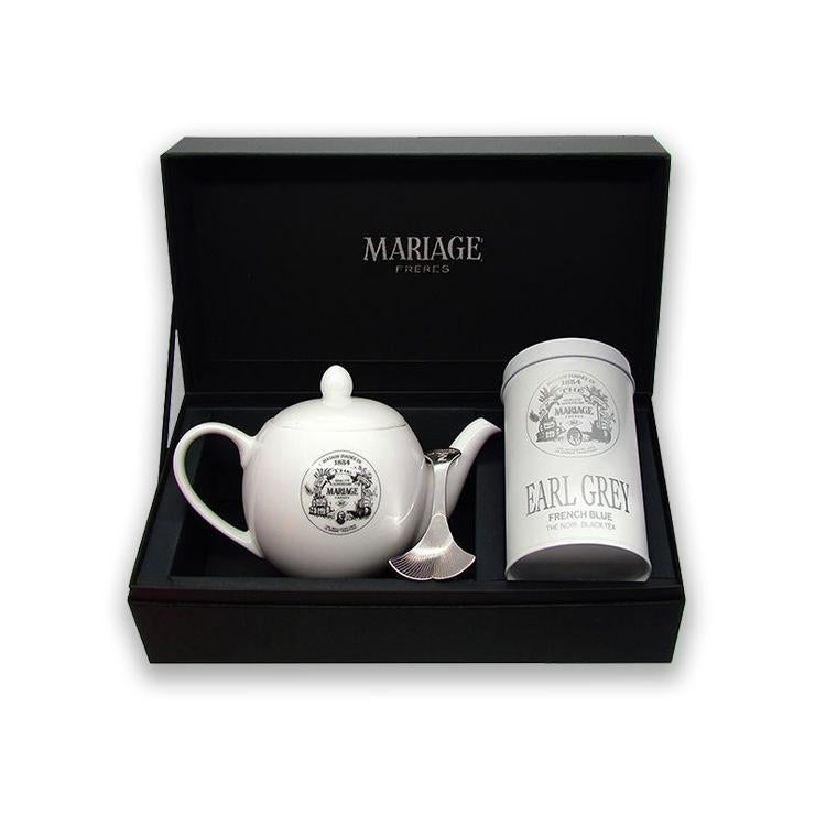 French Blue earl grey tea, teapot, and, mariage freres spoon displayed in a mariage freres box